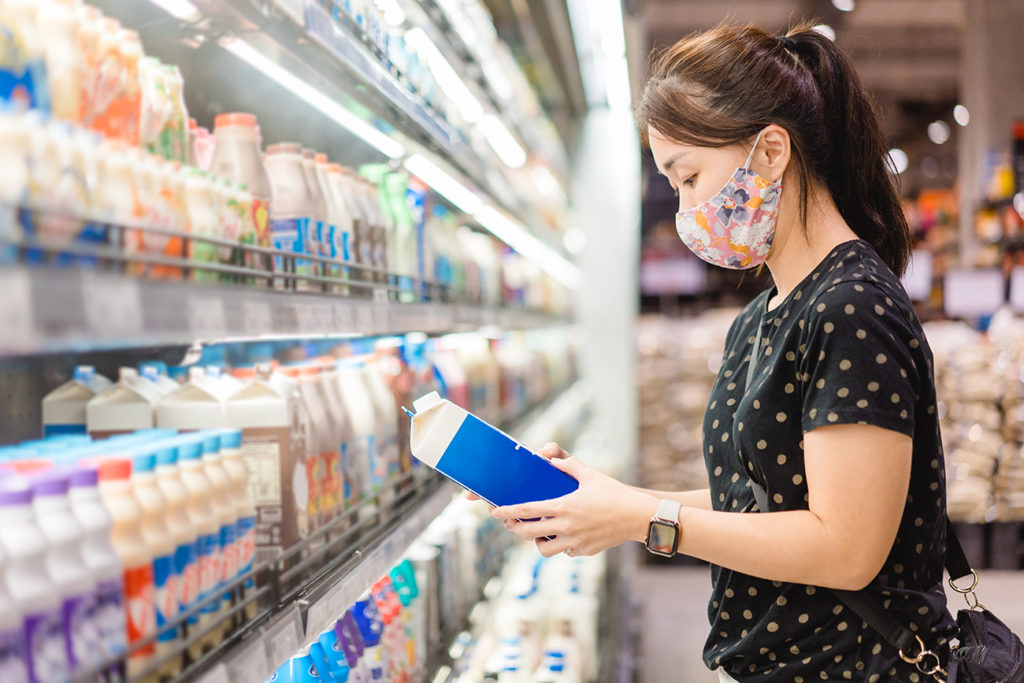 Shopping for milk in Japanese grocery store